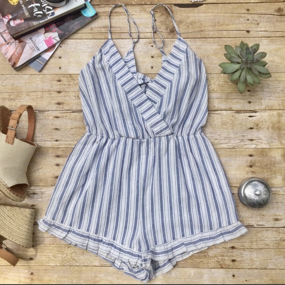 EUC Ruffle Hem Bow-Tie Back Romper